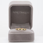 14K yellow gold Zambian emerald band ring with diamond accents