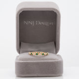 14K yellow gold Zambian emerald band ring with diamond accents