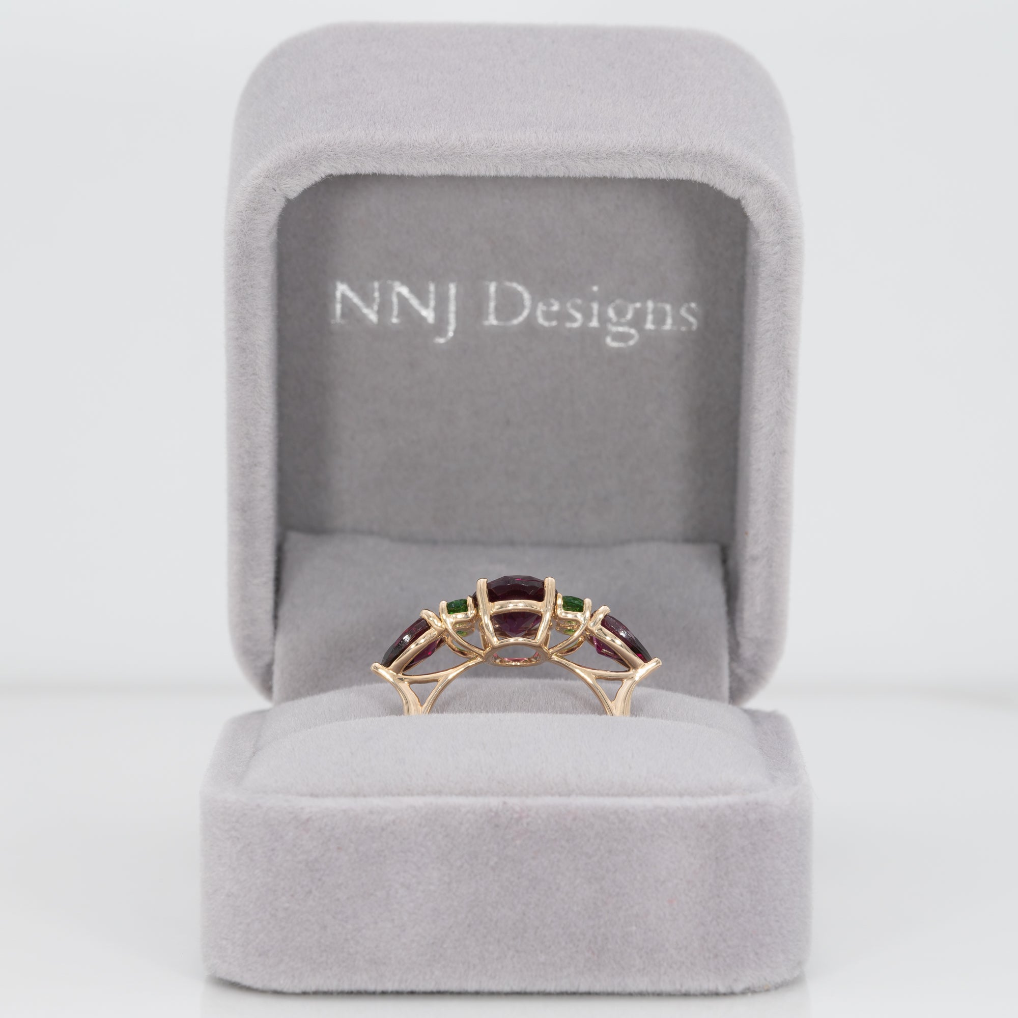 14K yellow gold purple garnet ring