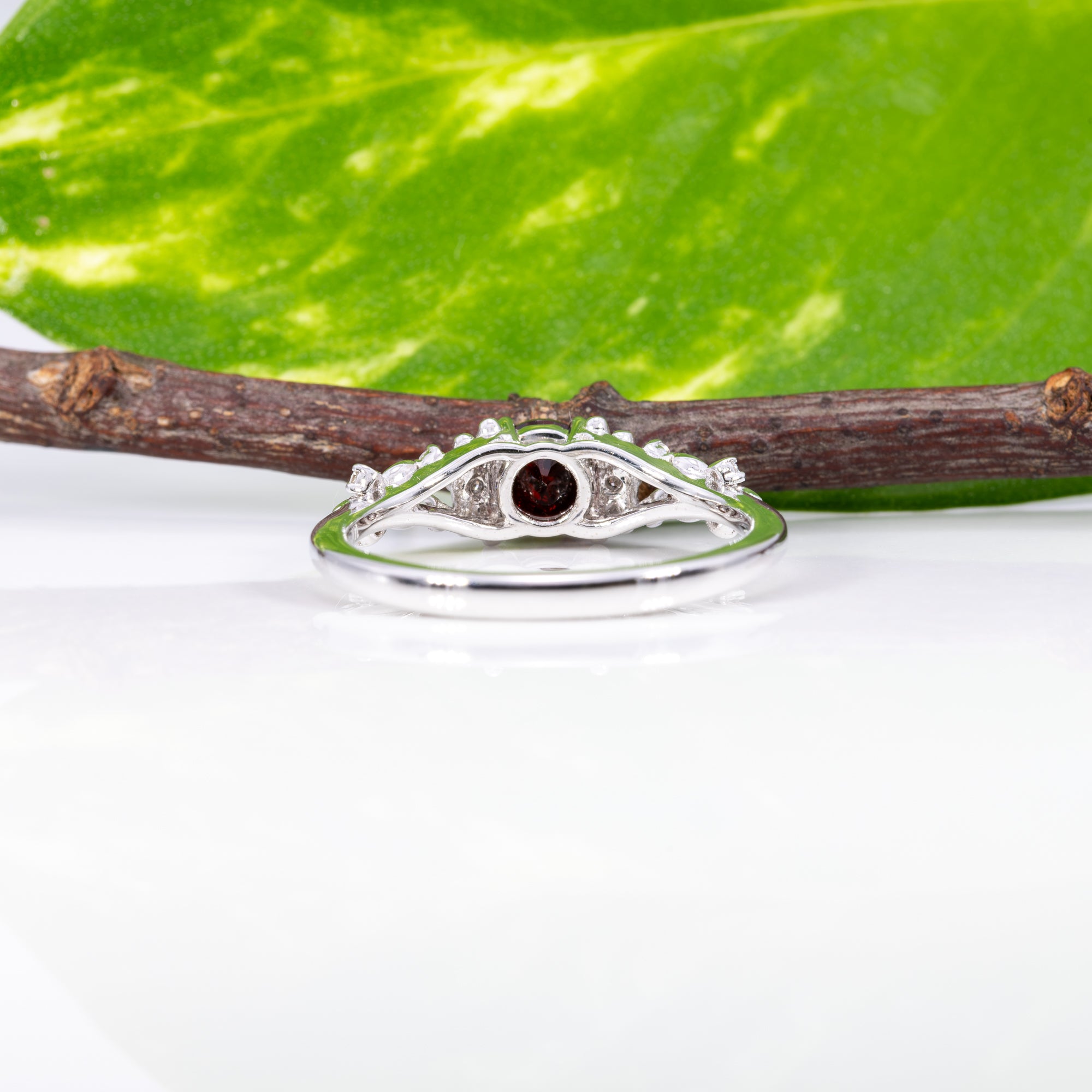 14K white gold red spinel ring with diamond accents