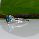 14K white gold Cambodian blue zircon cushion ring with diamond accents