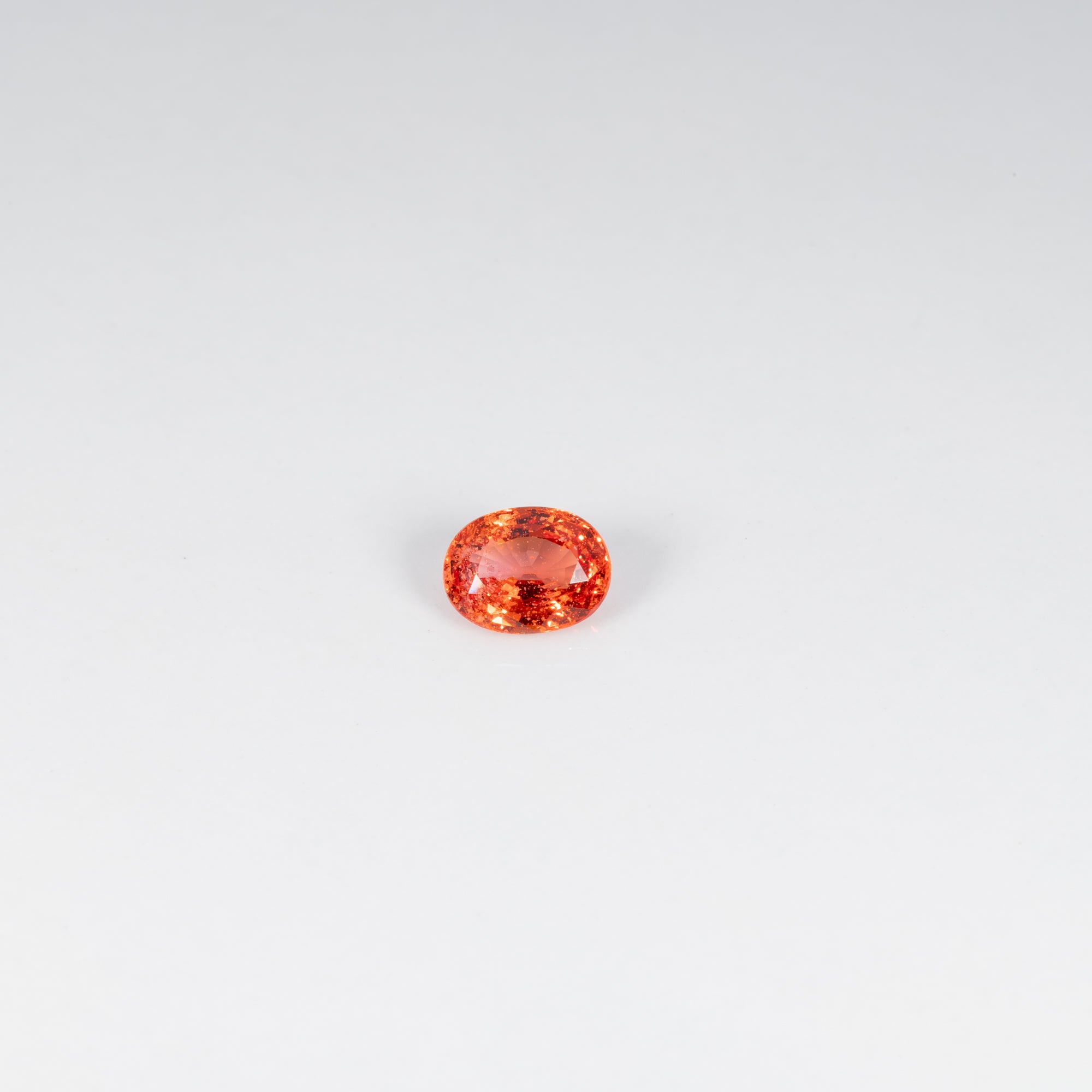 1.01 carat natural padparadscha sapphire, oval 6.7x5.1mm pink-orange loose gemstone