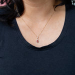 14K yellow gold padparadscha sapphire pendant