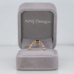 14K yellow gold red spinel ring with diamond accents