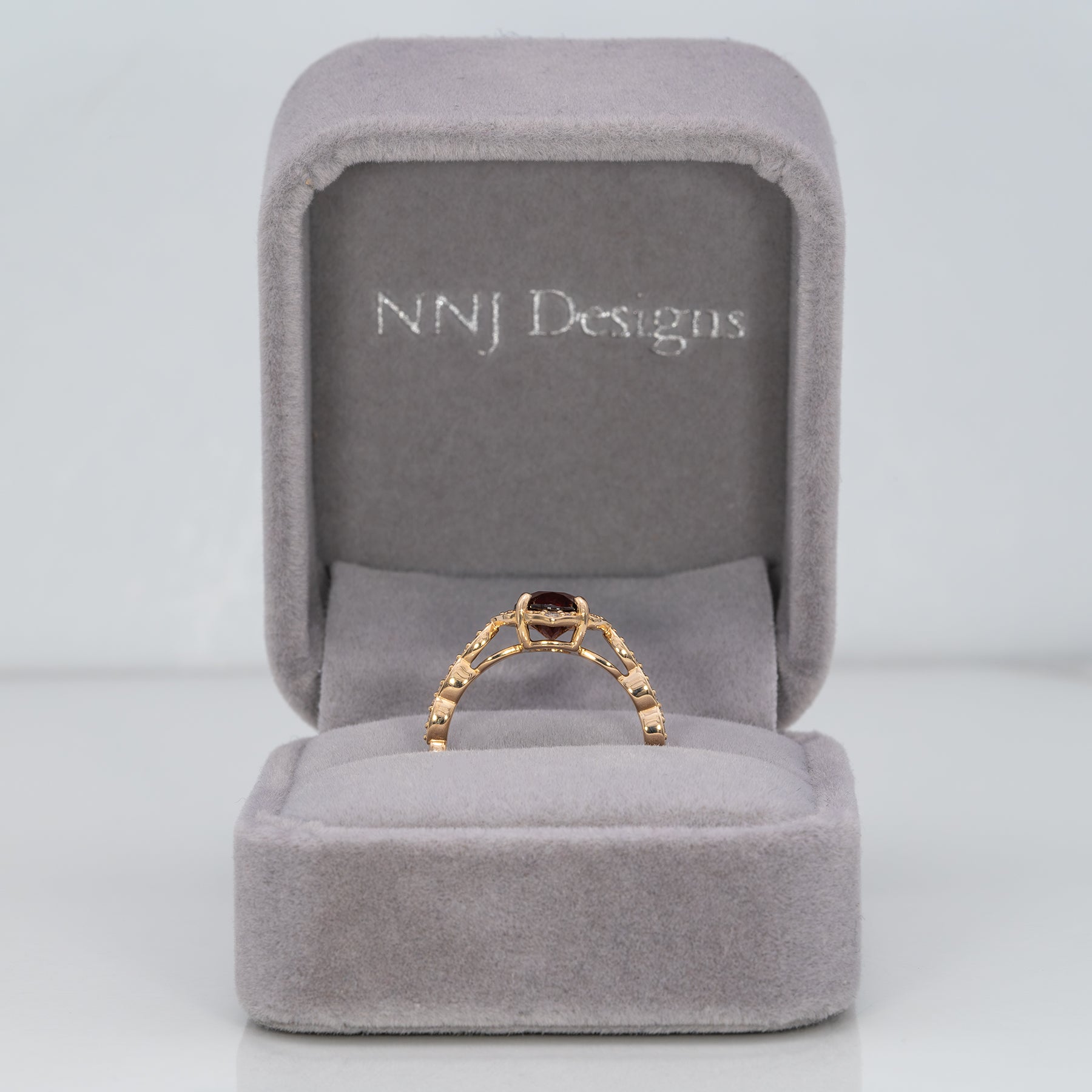14K yellow gold red spinel ring with diamond accents
