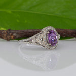 14K white gold pink sapphire oval ring with diamond halo