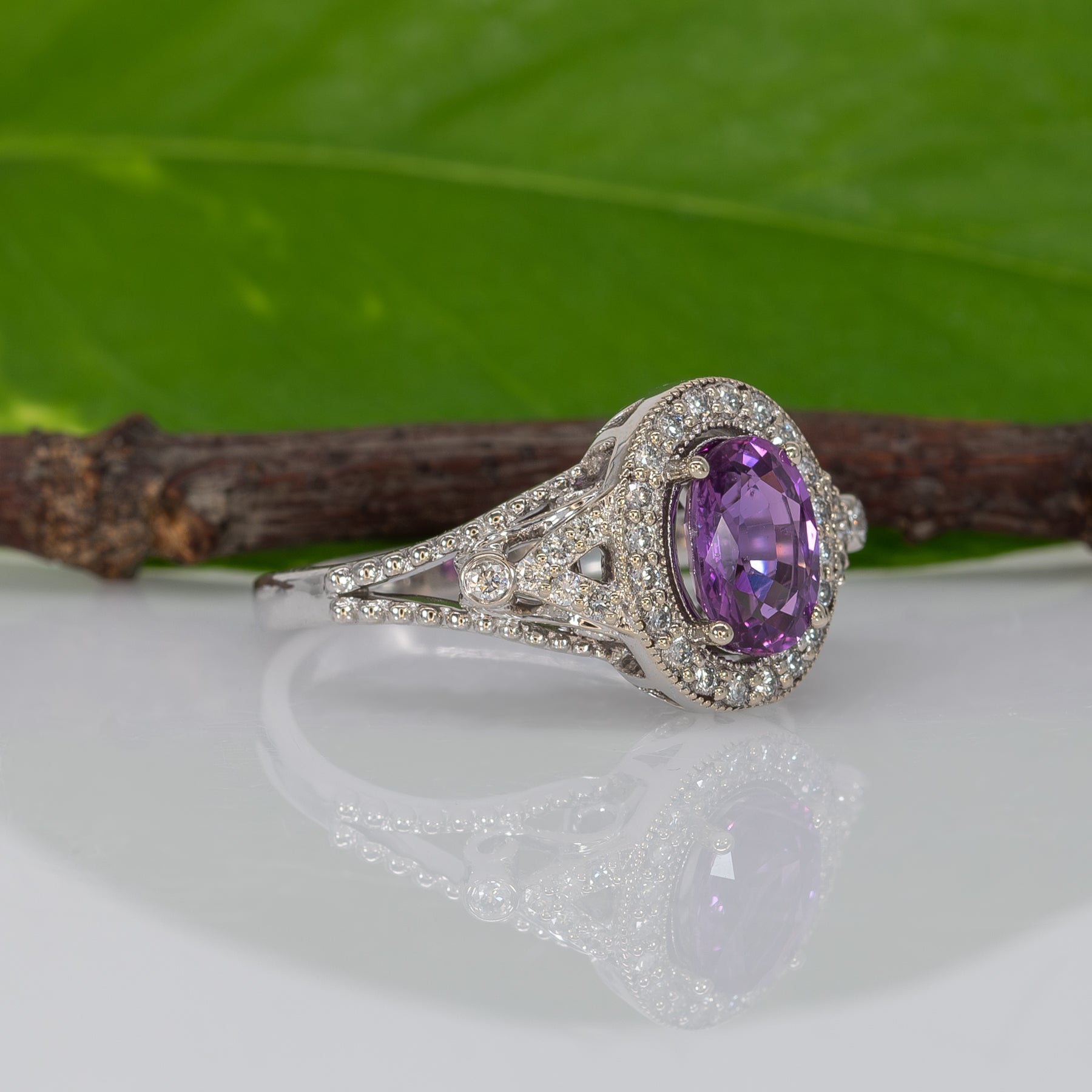 14K white gold pink sapphire oval ring with diamond halo