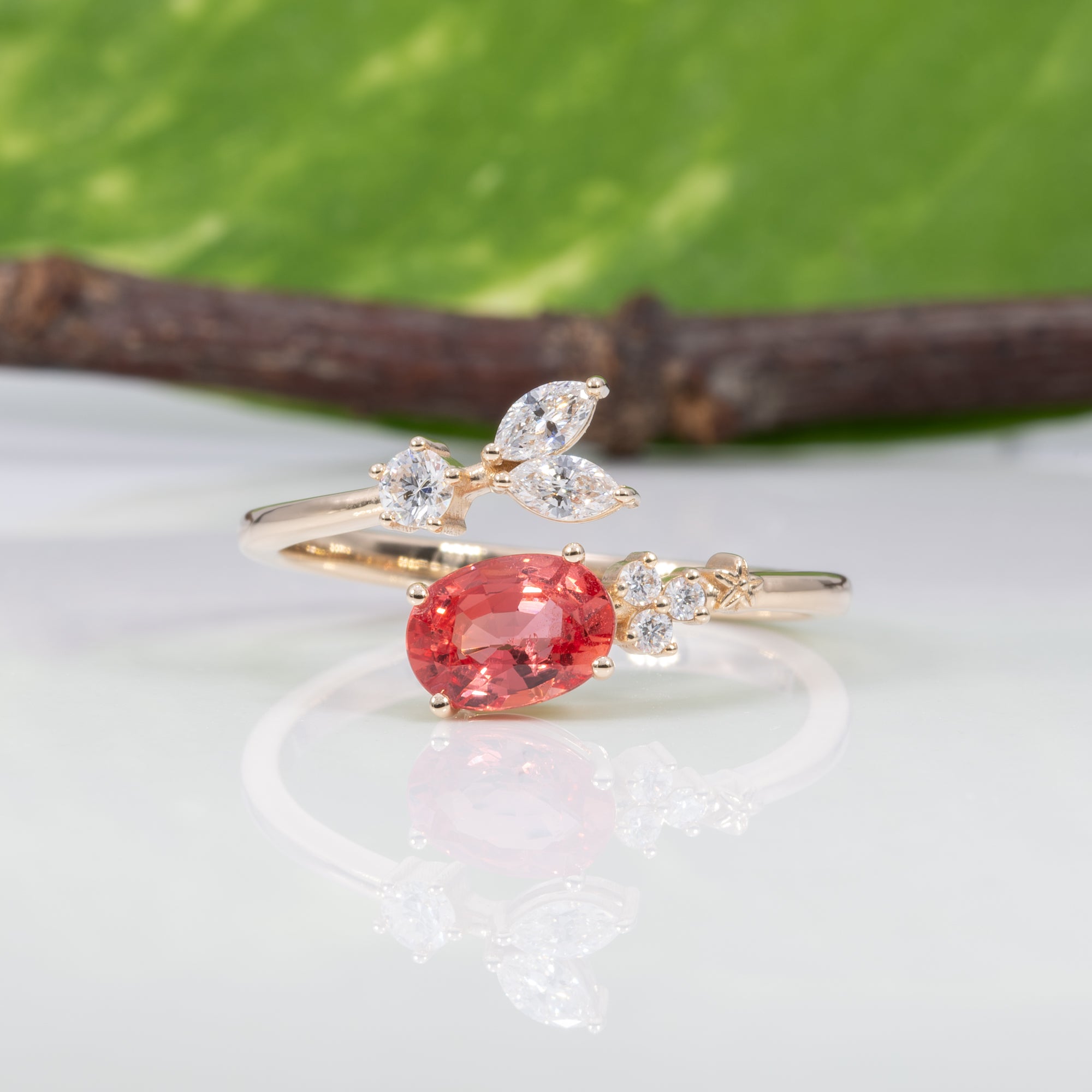 14K yellow gold padparadscha sapphire ring with diamond accents