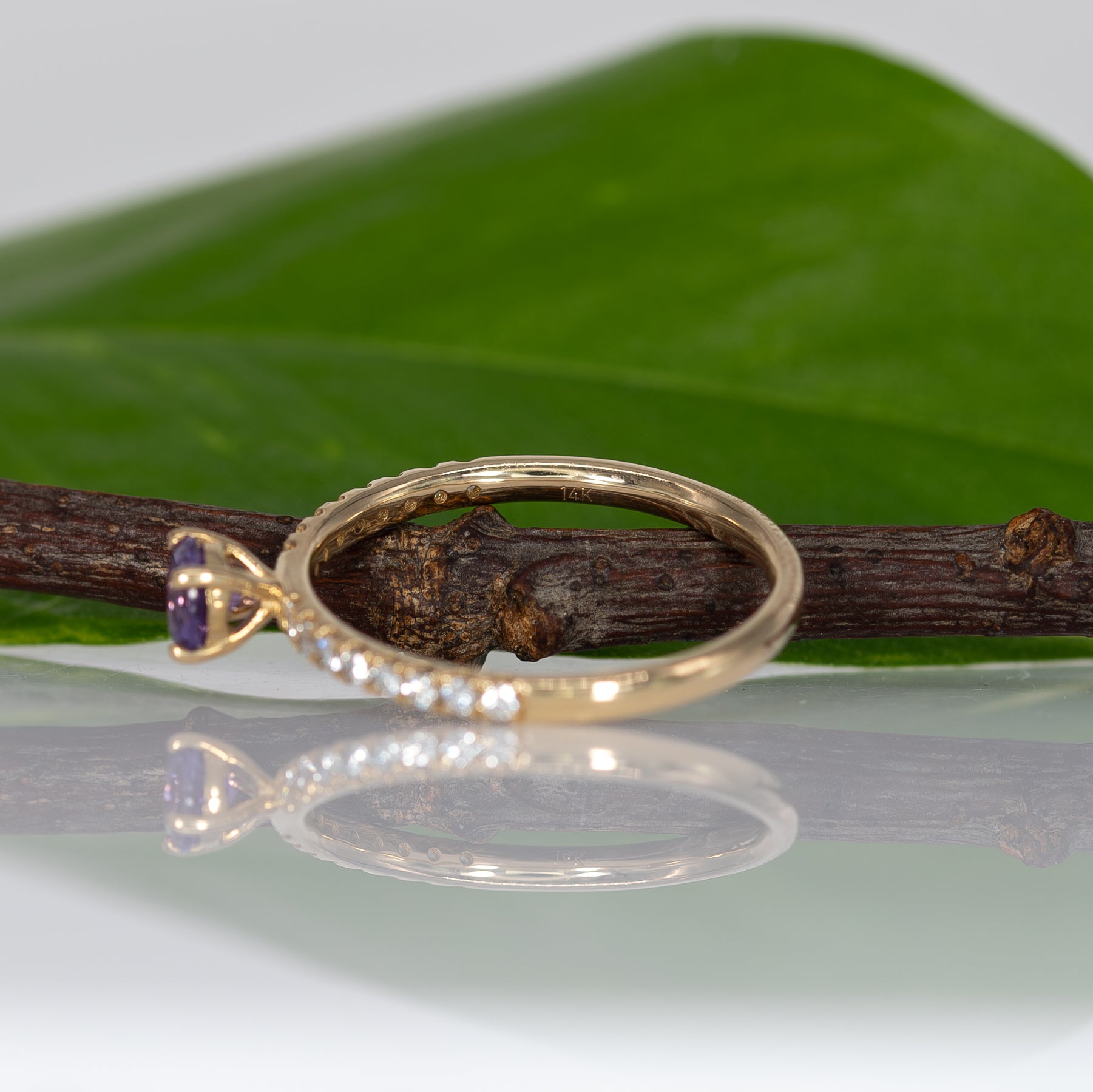 14K yellow gold purple sapphire round ring with diamond halo
