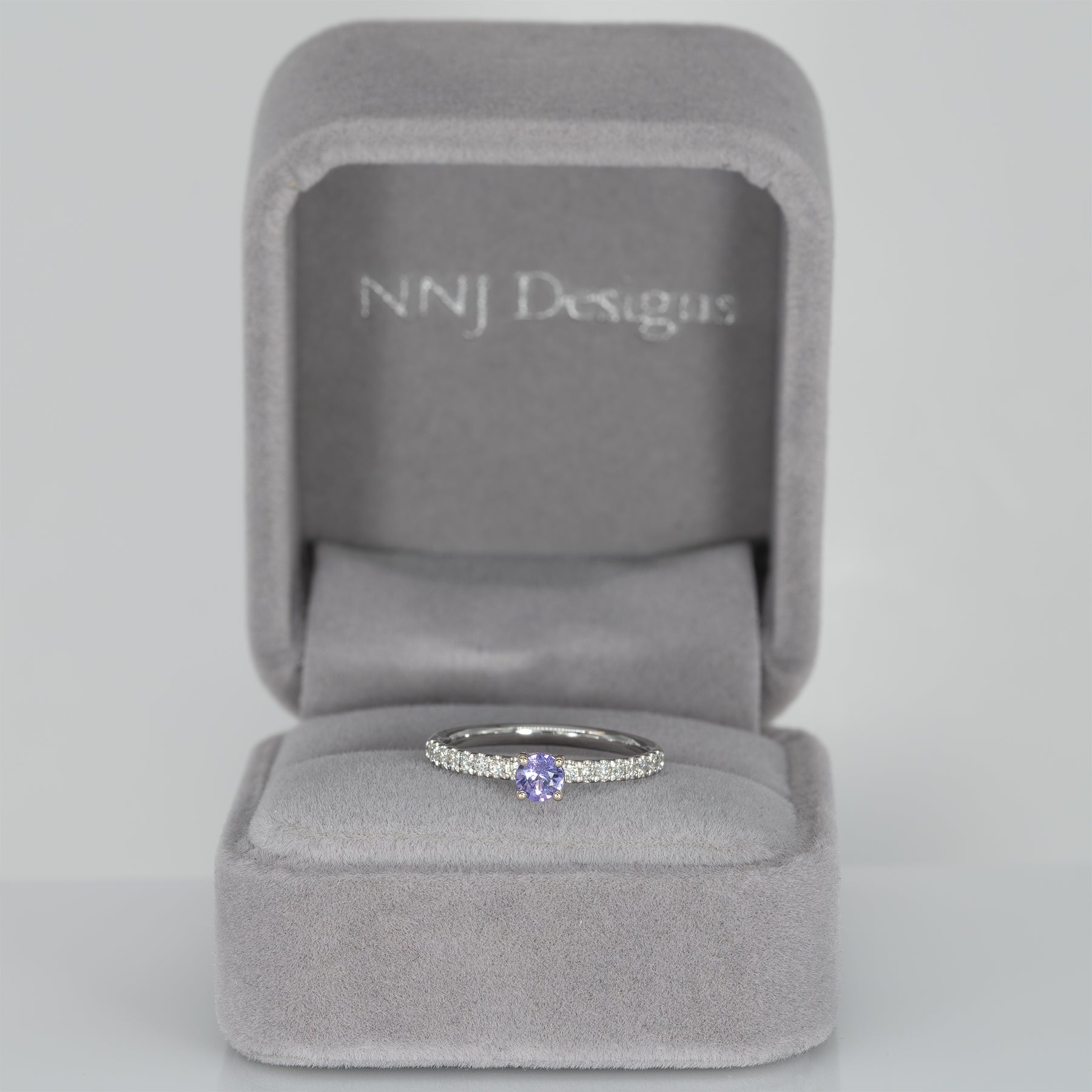 14K white gold purple sapphire round ring with diamond halo