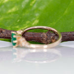 14K yellow gold colombian emerald ring with diamond accents