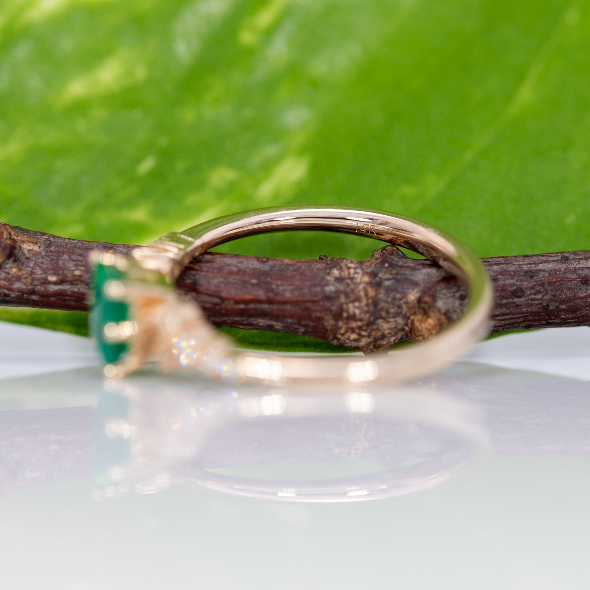 14K yellow gold colombian emerald ring with diamond accents