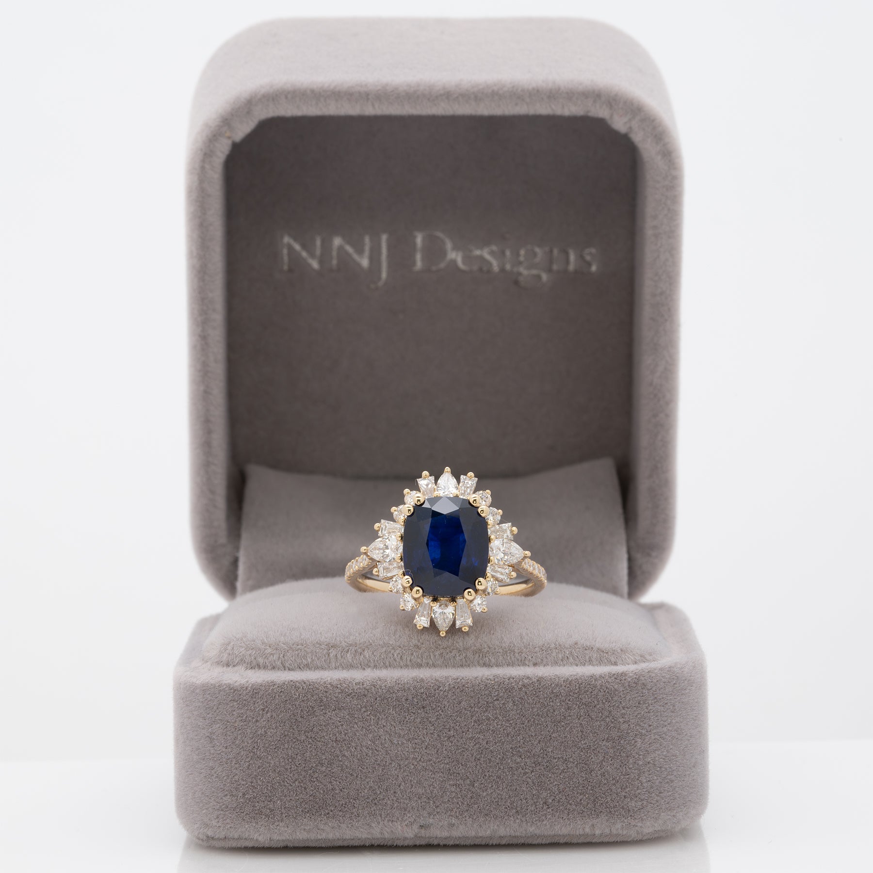 14K yellow gold GIA Ceylon sapphire cushion ring with diamond halo