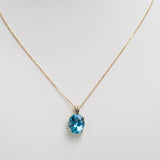 14K Yellow Gold Swiss Blue Topaz Pendant