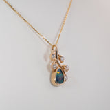14K yellow gold boulder opal pendant
