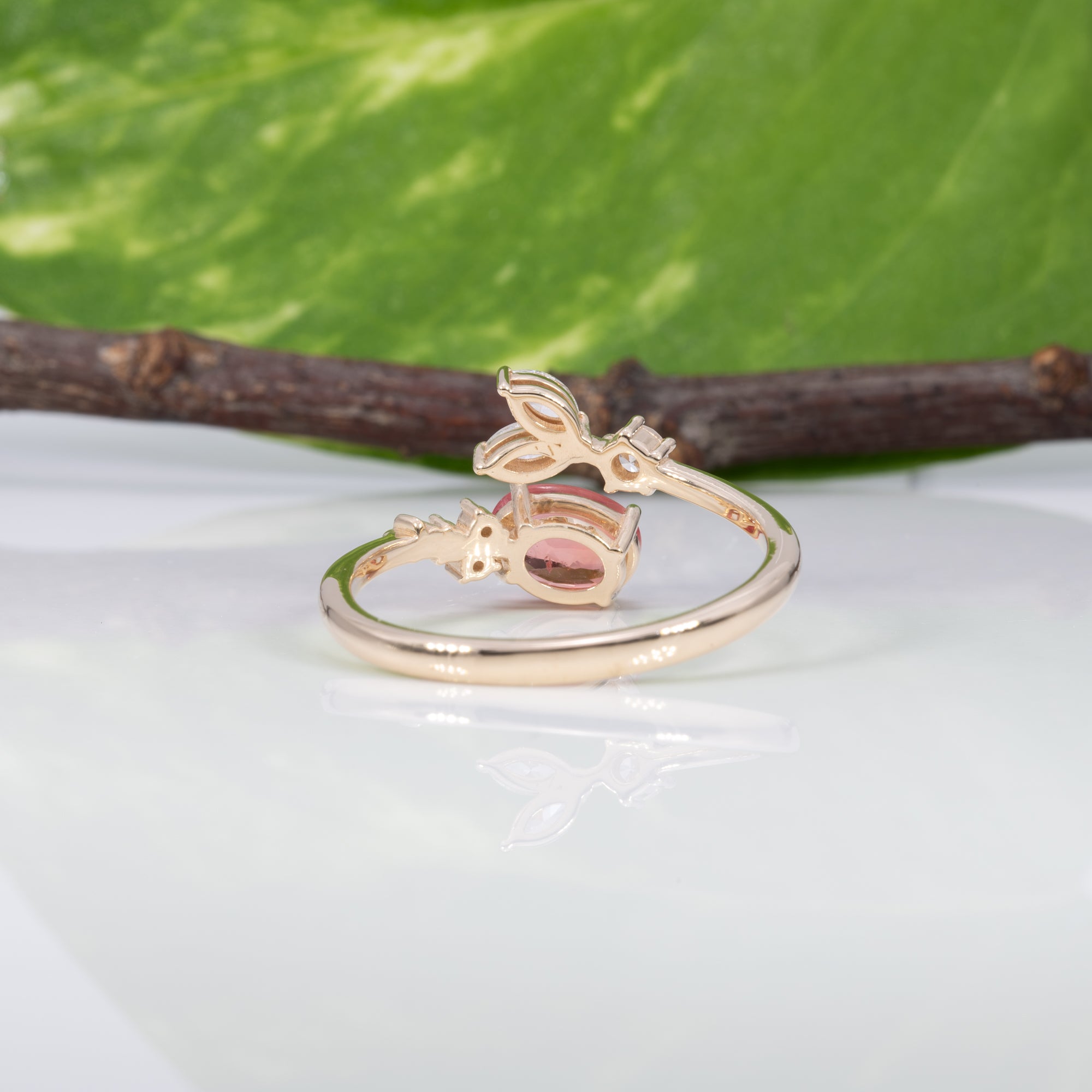 14K yellow gold padparadscha sapphire ring with diamond accents