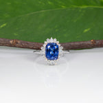 14K white and rose gold tanzanite ring with diamond accents