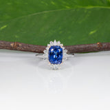14K white and rose gold tanzanite ring with diamond accents