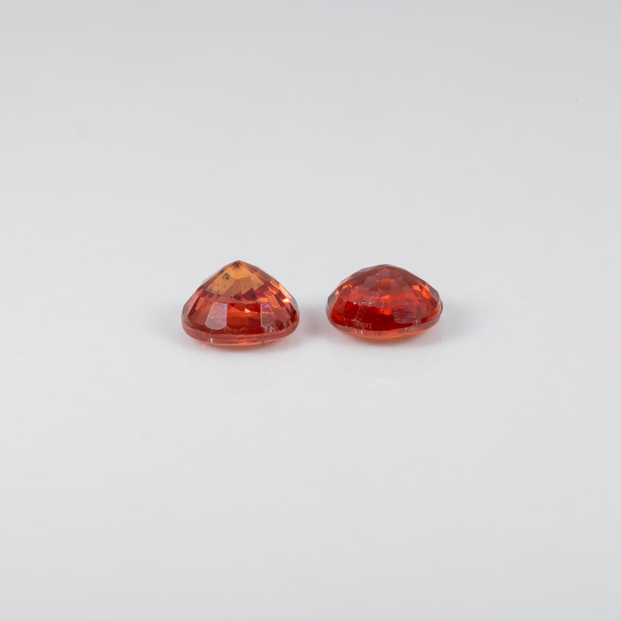 0.69 carat natural Ceylon orange sapphire round 5mm loose gemstone – view 4