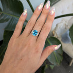 14K white gold Cambodian blue zircon cushion ring with diamond halo