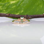 14K yellow gold colombian emerald ring with diamond accents