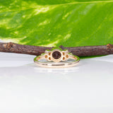 14K yellow gold bezel-set purple spinel ring with diamond accents