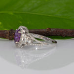 14K white gold pink sapphire oval ring with diamond halo