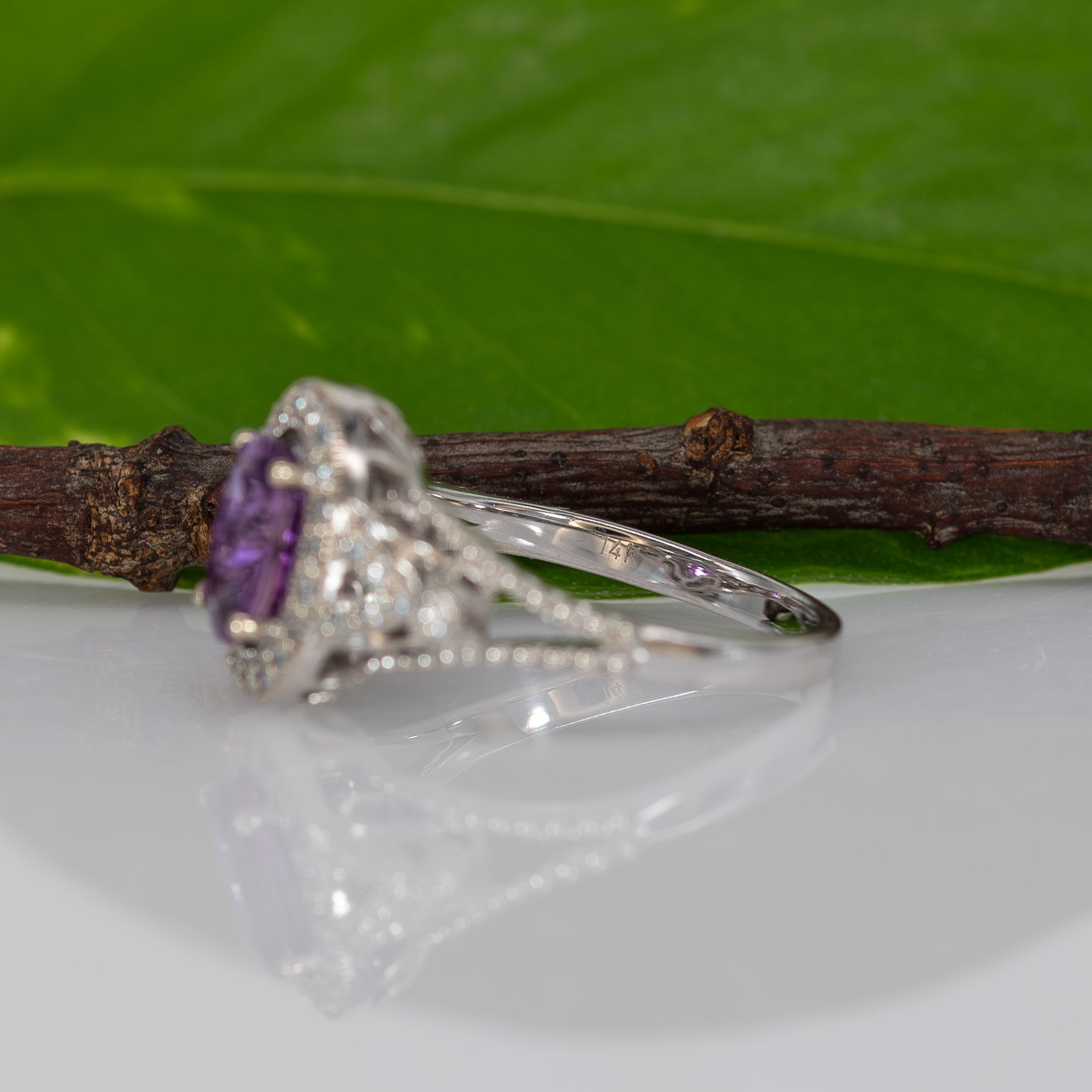 14K white gold pink sapphire oval ring with diamond halo