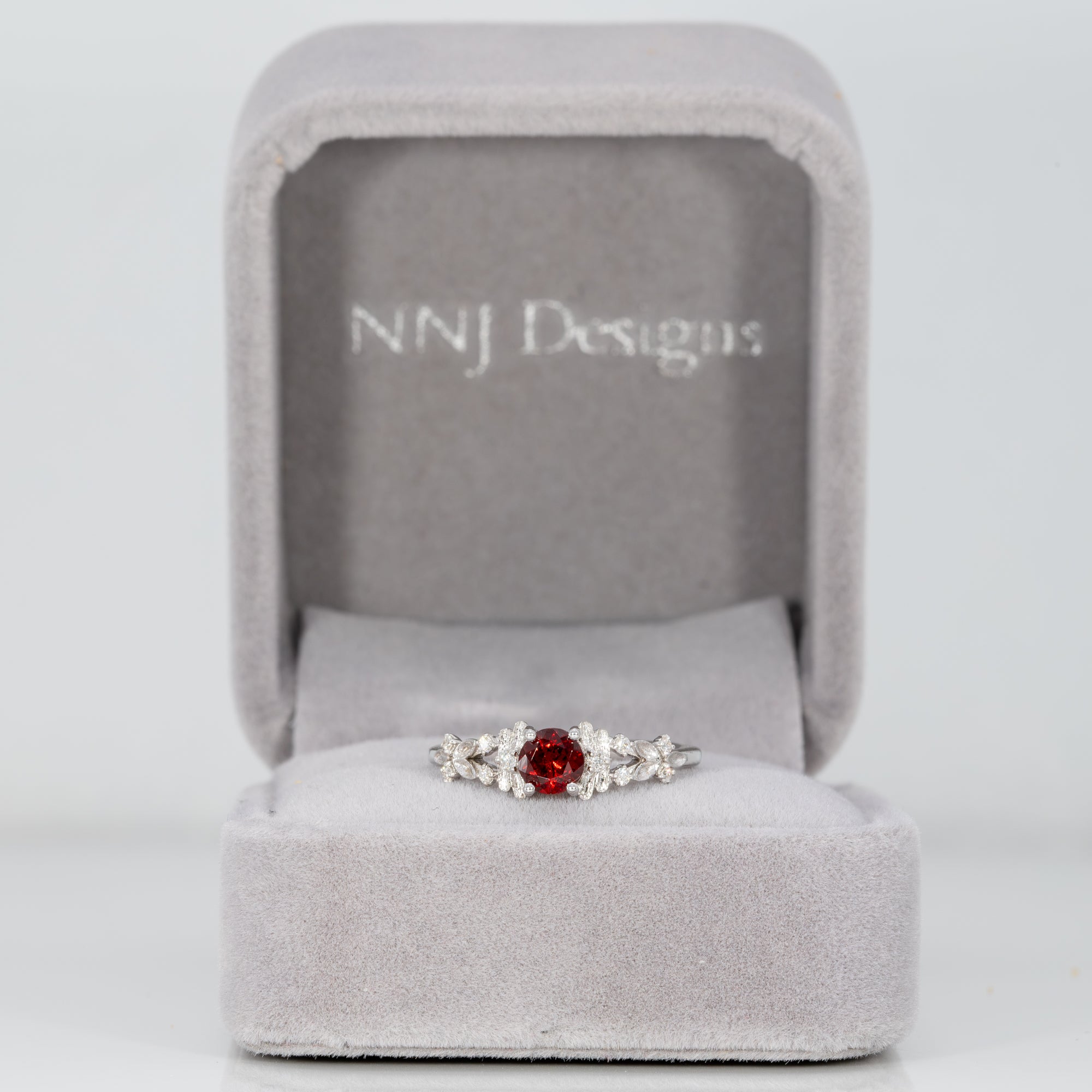14K white gold red spinel ring with diamond accents