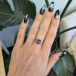 14K yellow gold cushion tanzanite ring with diamond accents