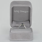 14K white gold teal sapphire oval ring with diamond halo