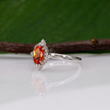 14K white gold padparadscha sapphire ring with diamond halo