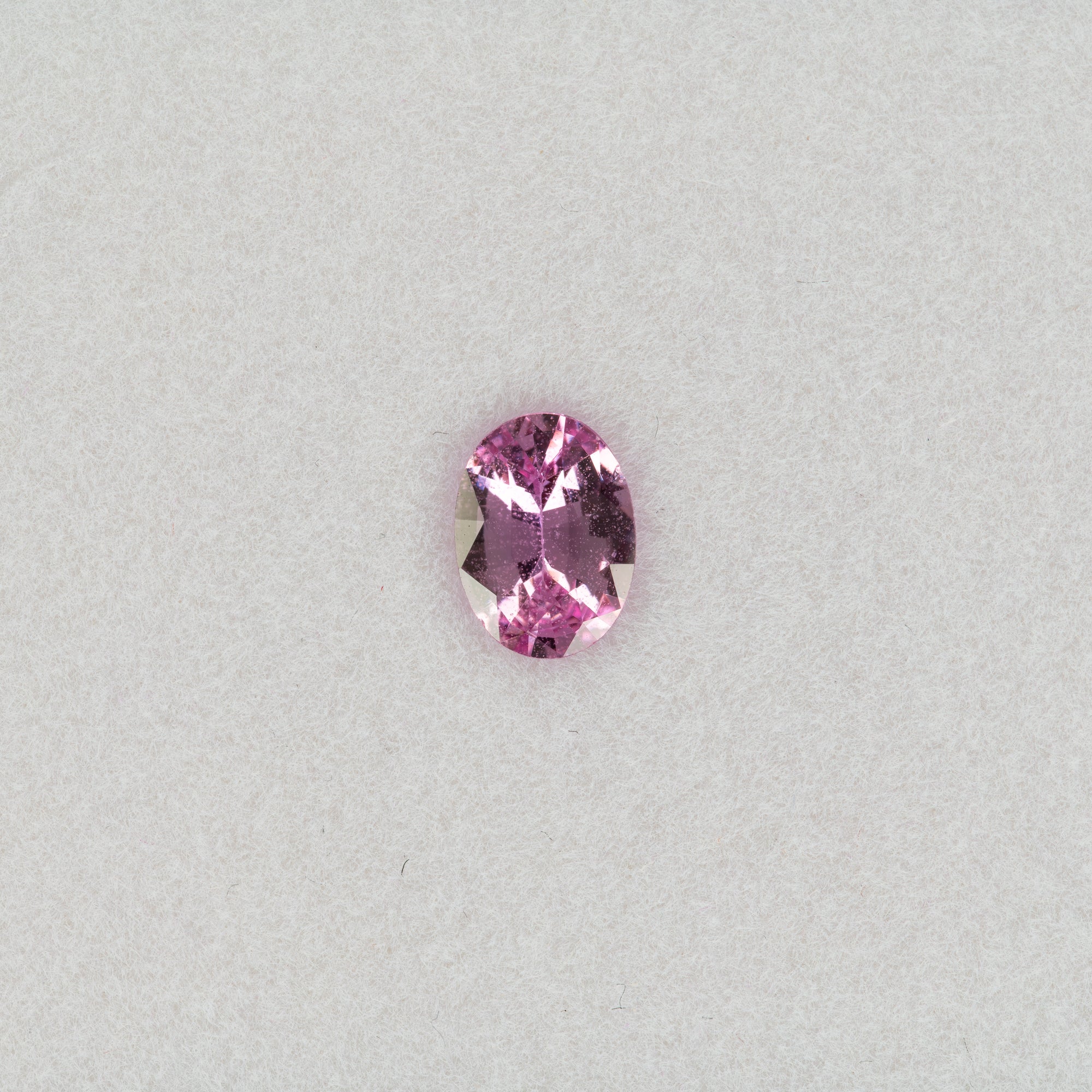 0.68 carat natural pink sapphire, oval 6.8x5mm loose gemstone