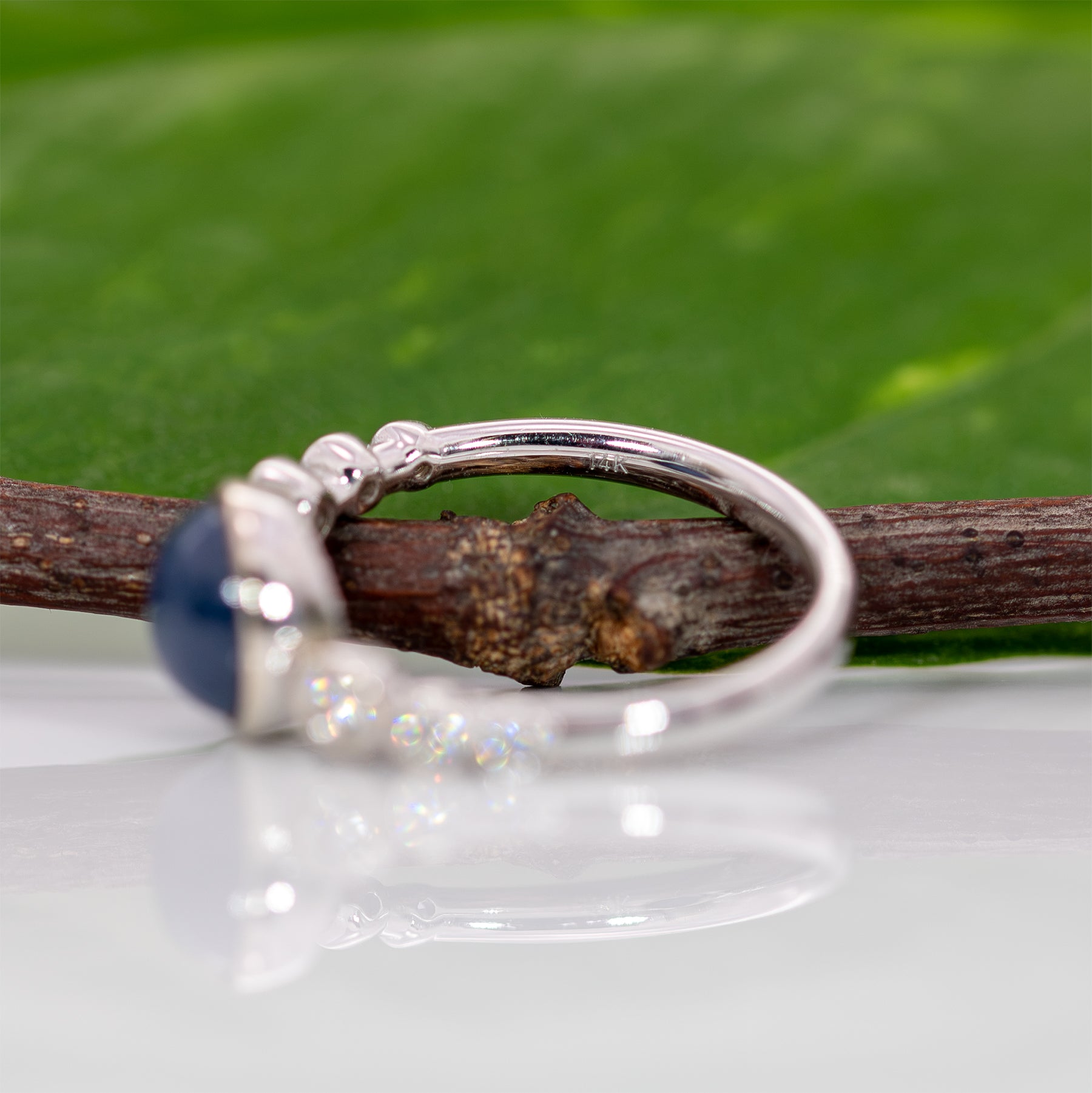 14K white gold blue star sapphire cabochon ring with diamonds
