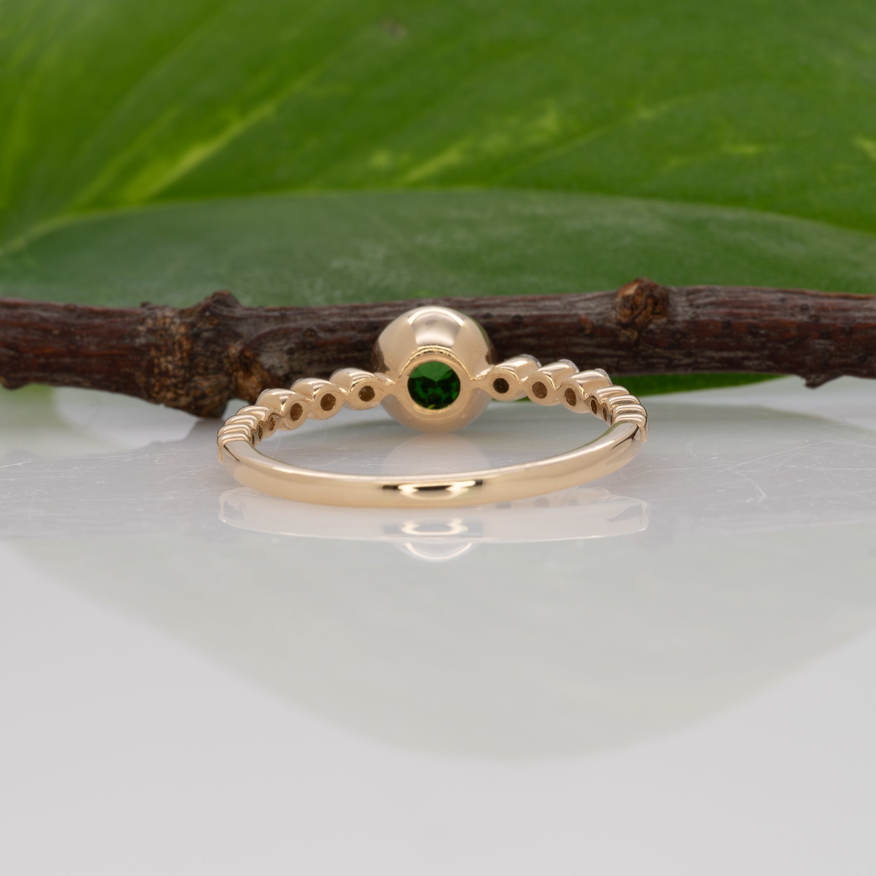 14K yellow gold tsavorite garnet round ring with diamond accents