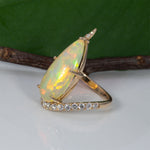 14K yellow gold Ethiopian opal cabochon ring with diamonds