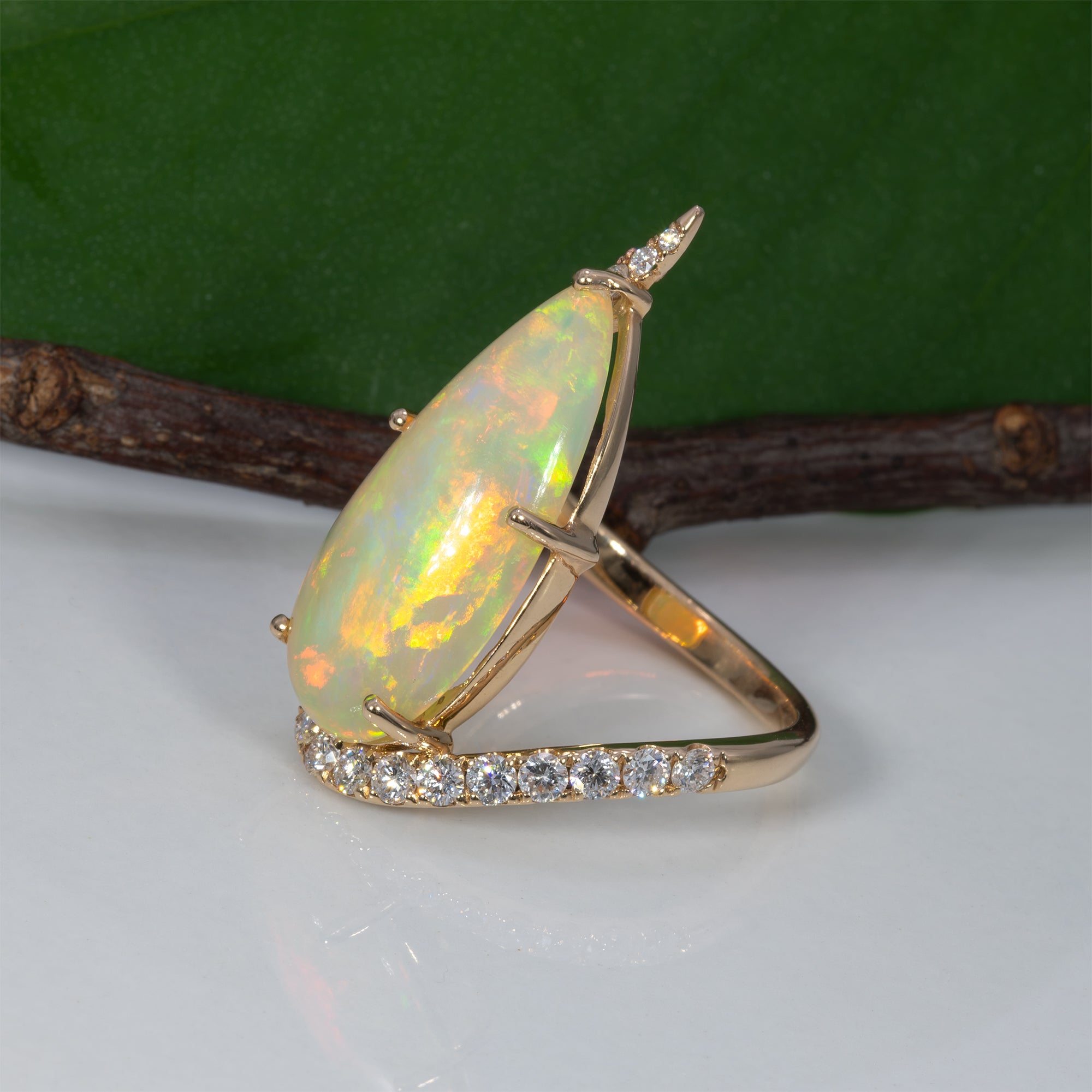 14K yellow gold Ethiopian opal cabochon ring with diamonds
