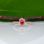 14K yellow gold padparadscha sapphire ring with diamond accents
