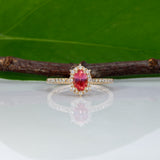 14K yellow gold padparadscha sapphire ring with diamond accents
