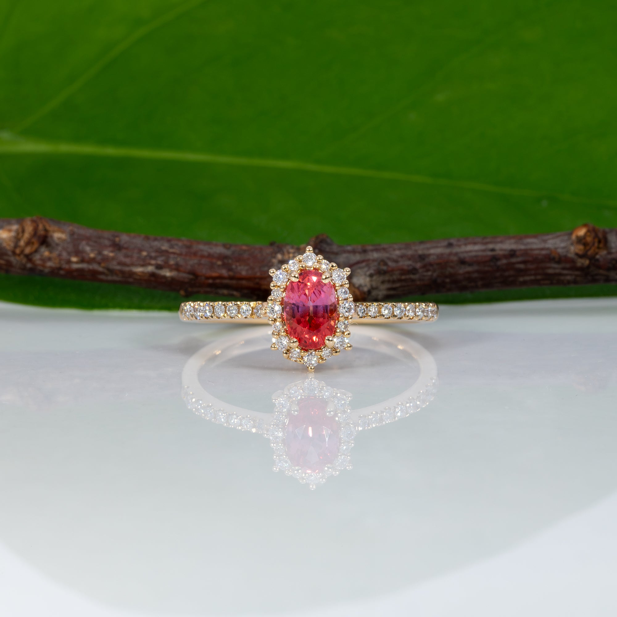 14K yellow gold padparadscha sapphire ring with diamond accents