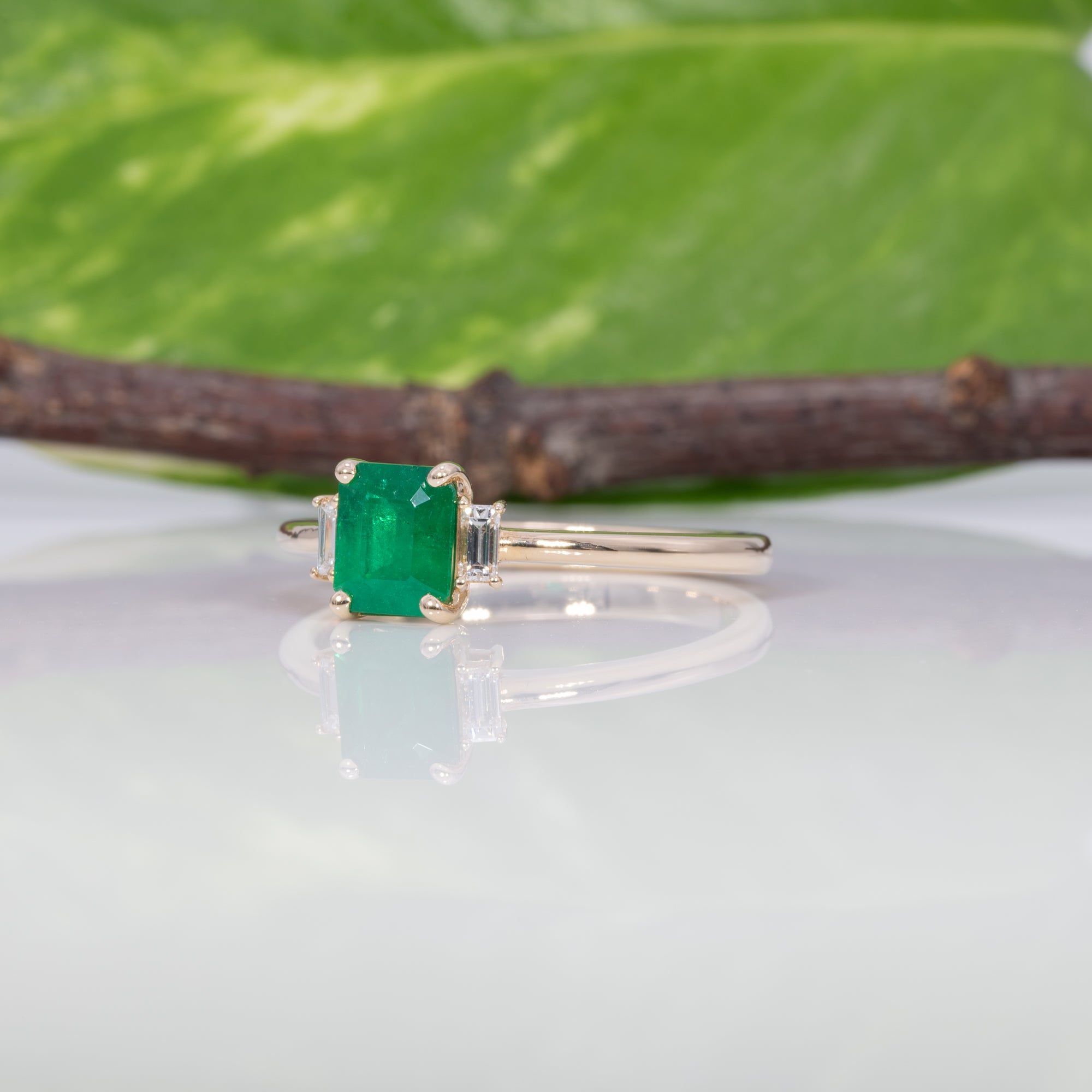 14K yellow gold colombian emerald ring with diamond accents