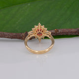 14K yellow gold padparadscha sapphire ring with diamond accents