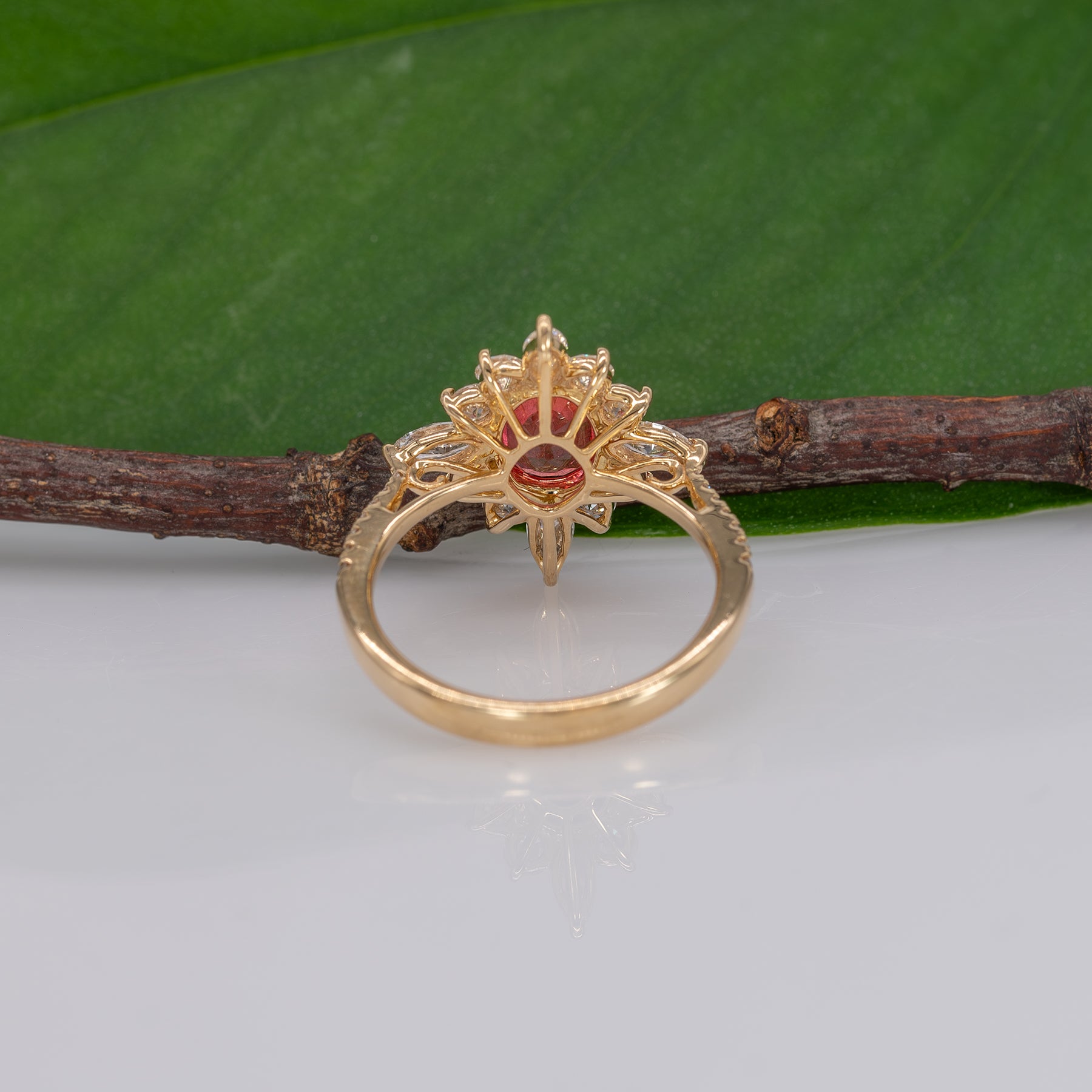 14K yellow gold padparadscha sapphire ring with diamond accents