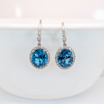 London Blue Topaz Stud Earrings in 14K White Gold | Diamond Accents | Oval Cut | 11x9mm | November Birthstone
