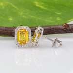 14K white gold yellow sapphire stud earrings with diamond halo
