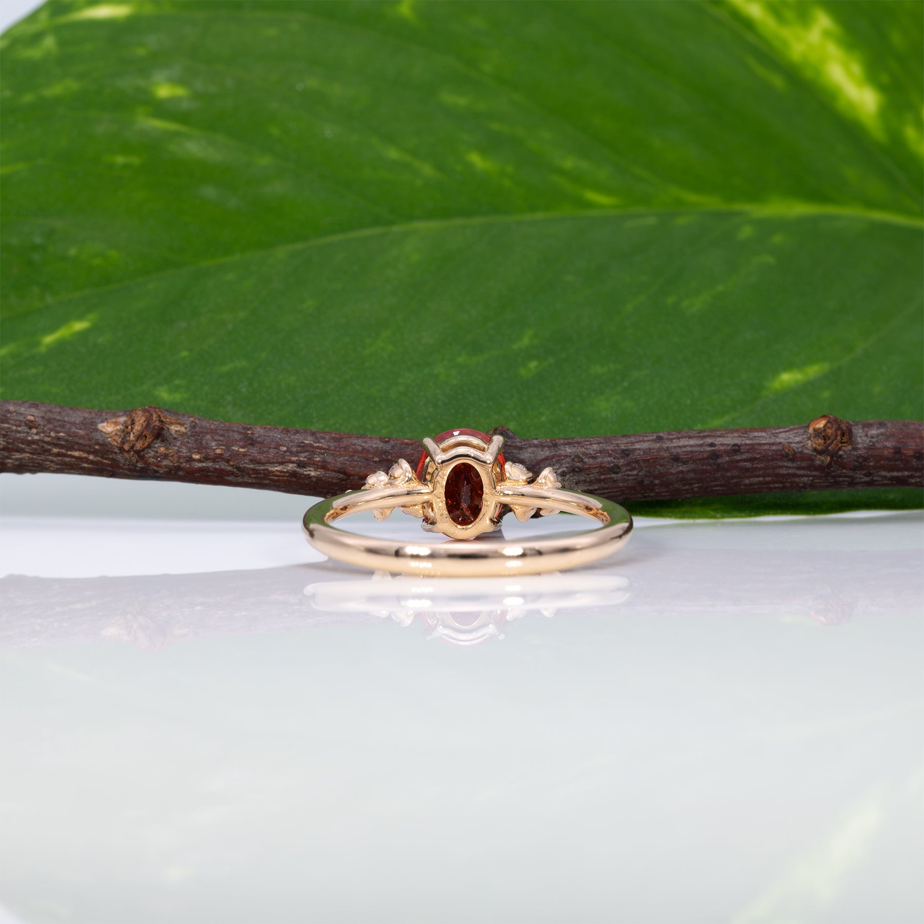 14K yellow gold padparadscha sapphire ring with diamonds