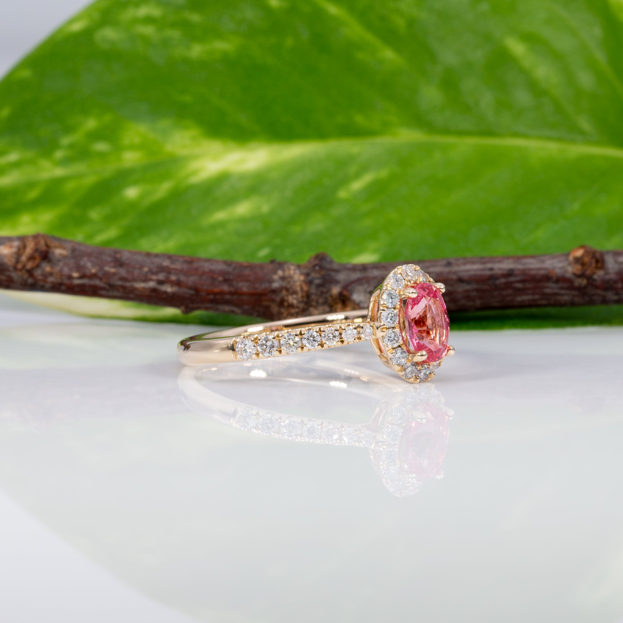 14K yellow gold padparadscha sapphire ring with diamond accents