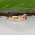 14K yellow gold purple spinel round ring with diamond accents
