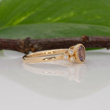 14K yellow gold purple spinel round ring with diamond accents