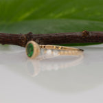 14K yellow gold tsavorite garnet round ring with diamond accents